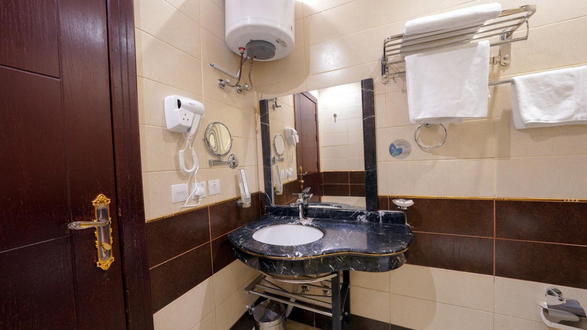 Al Masem Serviced Apartments - Exit 9 Riade Quarto foto